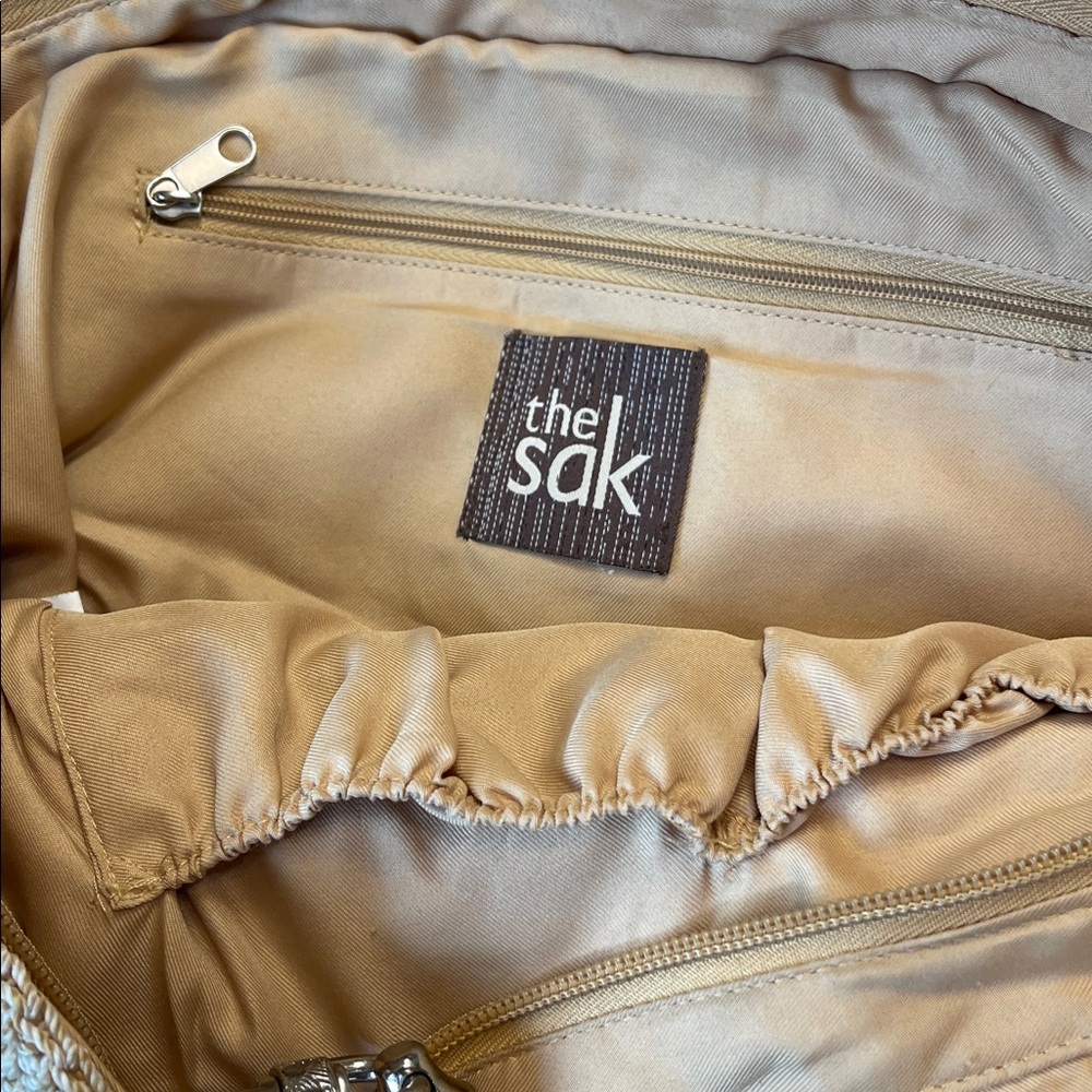 The Sak Crochet Neutral Stripes Coastal Bag with Faux Leather Braided Handles - Picture 10 of 10